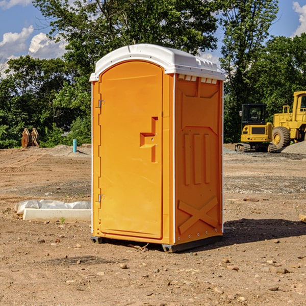 what is the cost difference between standard and deluxe porta potty rentals in Aragon